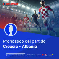 La Imagen Muestra A Jugadores De Los Equipos De Croacia Y Albania En Acción En Un Estadio Iluminado Y Lleno De Espectadores. En La Parte Inferior, Dentro De Un Recuadro Azul, Se Lee El Texto 