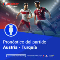 La Imagen Muestra A Jugadores De Los Equipos De Austria Y Turquía En Un Estadio Iluminado Y Lleno De Espectadores. Los Jugadores Están En Plena Acción, Con El Balón En El Campo. En La Parte Inferior, Dentro De Un Recuadro Azul, Se Lee El Texto 